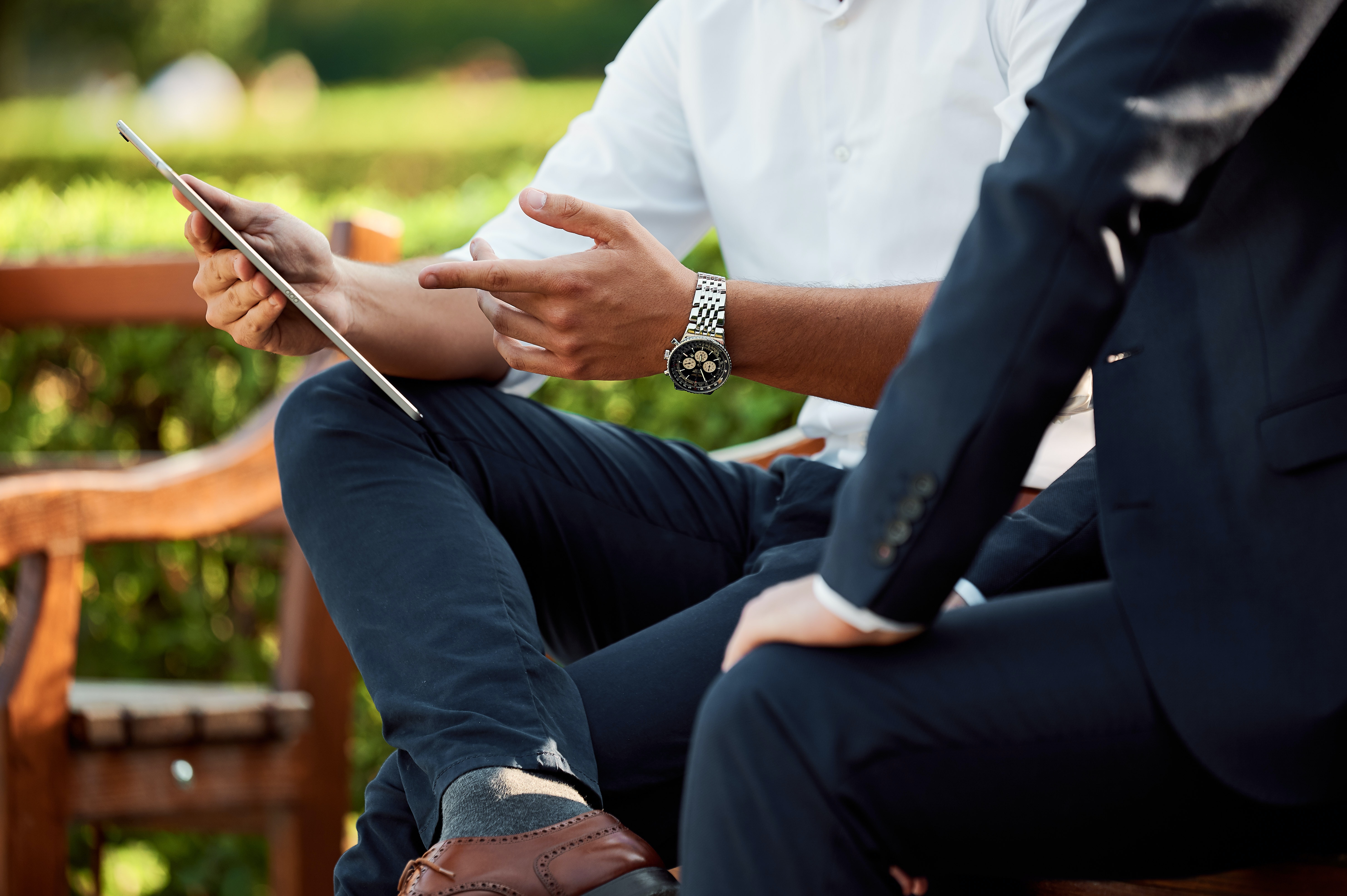 two people discussing outside